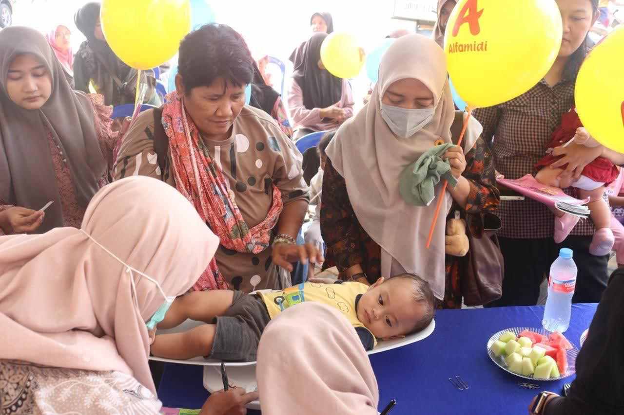 ​Gandeng Puskesmas, Alfamidi Pasuruan Ajak Orang Tua Jaga Gizi dan Tumbuh Kembang Anak